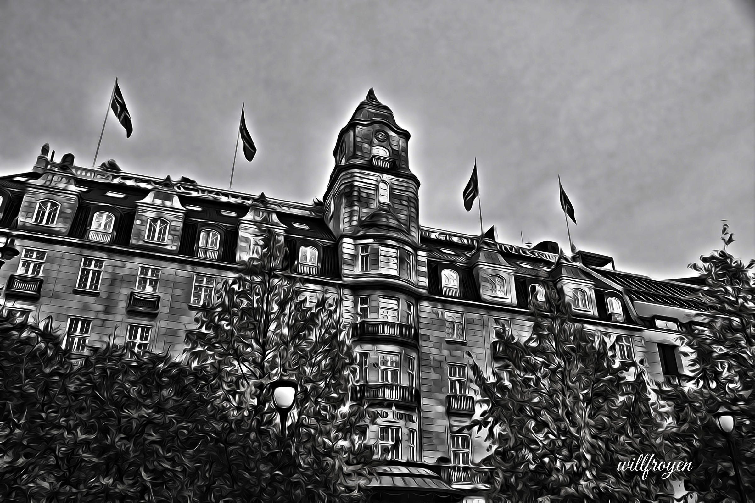 A black and white photo of Grand Hotel in Oslo with a painterly edit